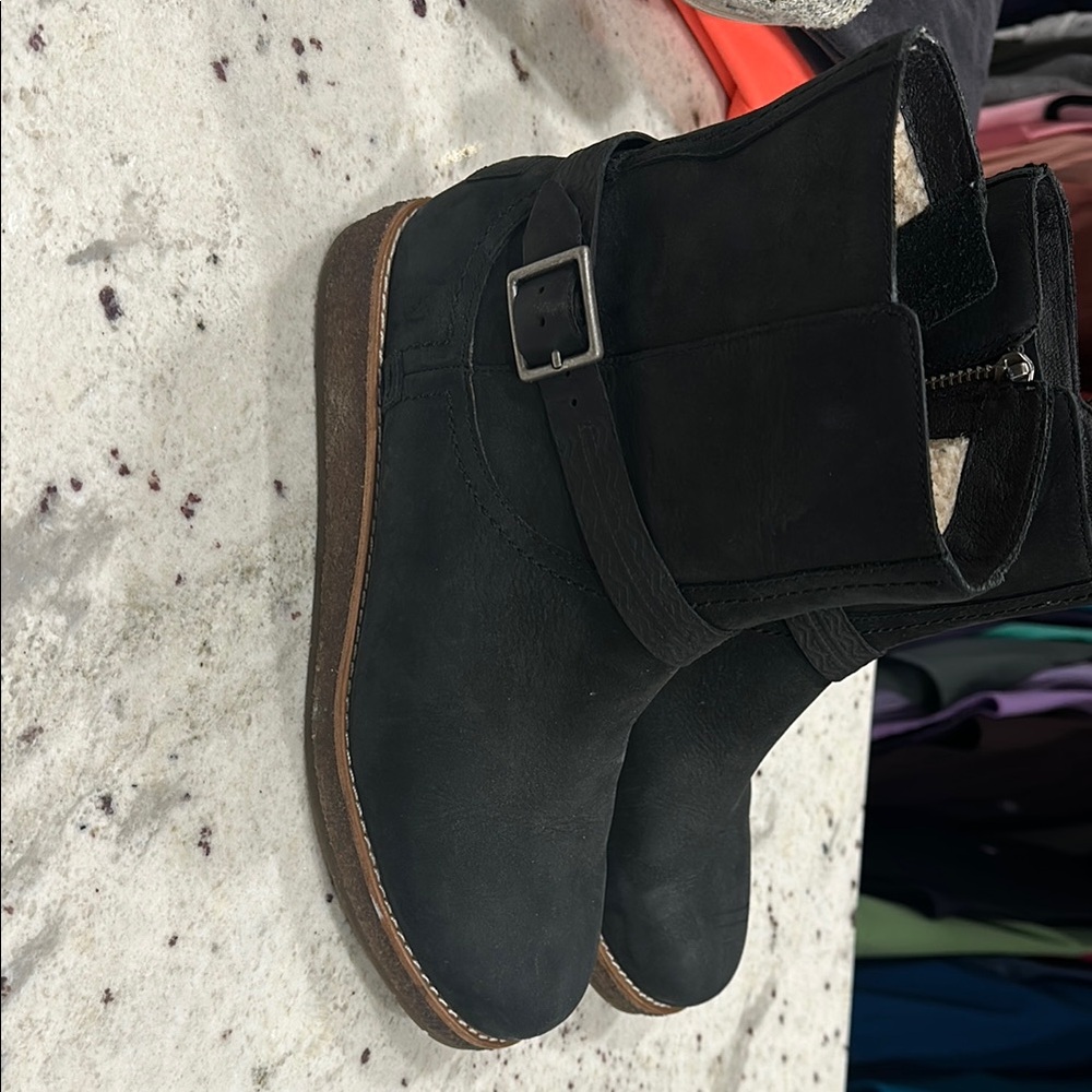 Used. Good condition Ugg booties. 
1 small scuff on the toe